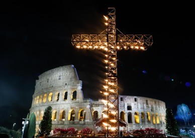 Pope prays at home while thousands attend Way of the Cross at Colosseum