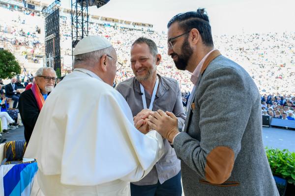 Pope Francis with an Israeli and a Palestinian committed to peace
